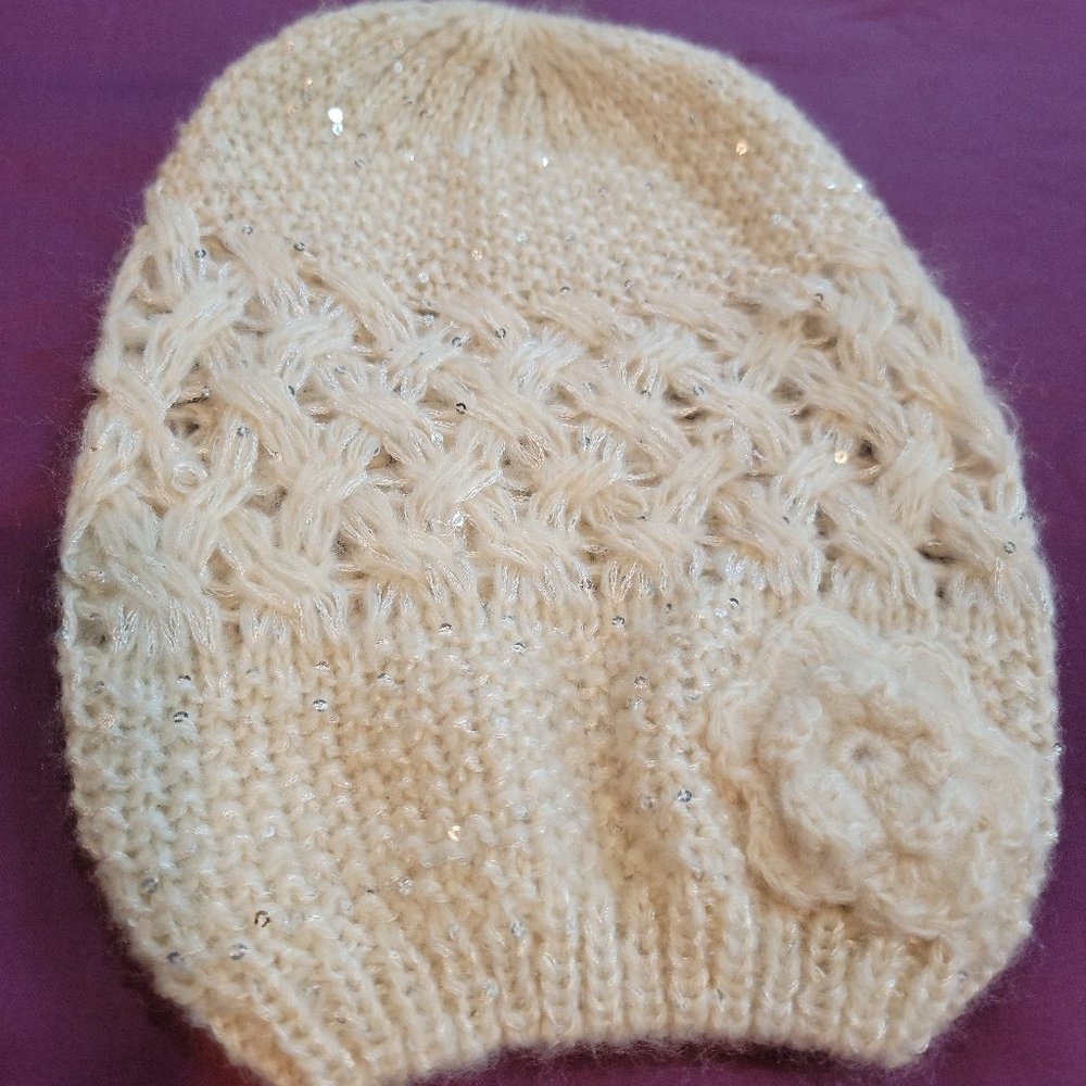 Cream colored hat with sparkles